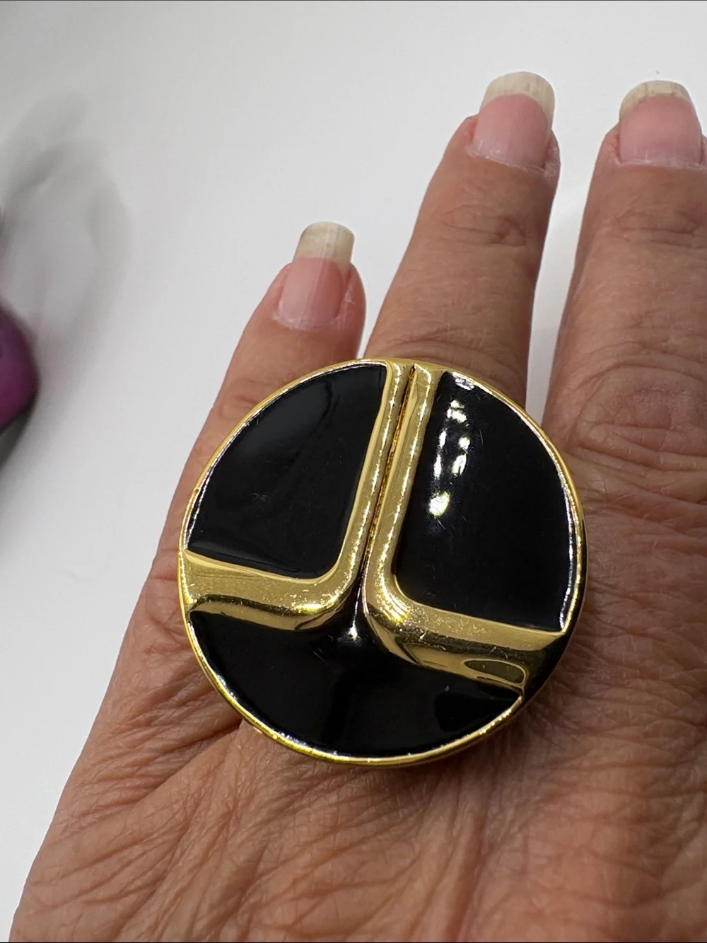 Trina Turk Gold Tone Ring with Black Enamel Initials Inlay